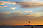 Seagulls in Sunset in Walberswick, Sizewell  B in background, England